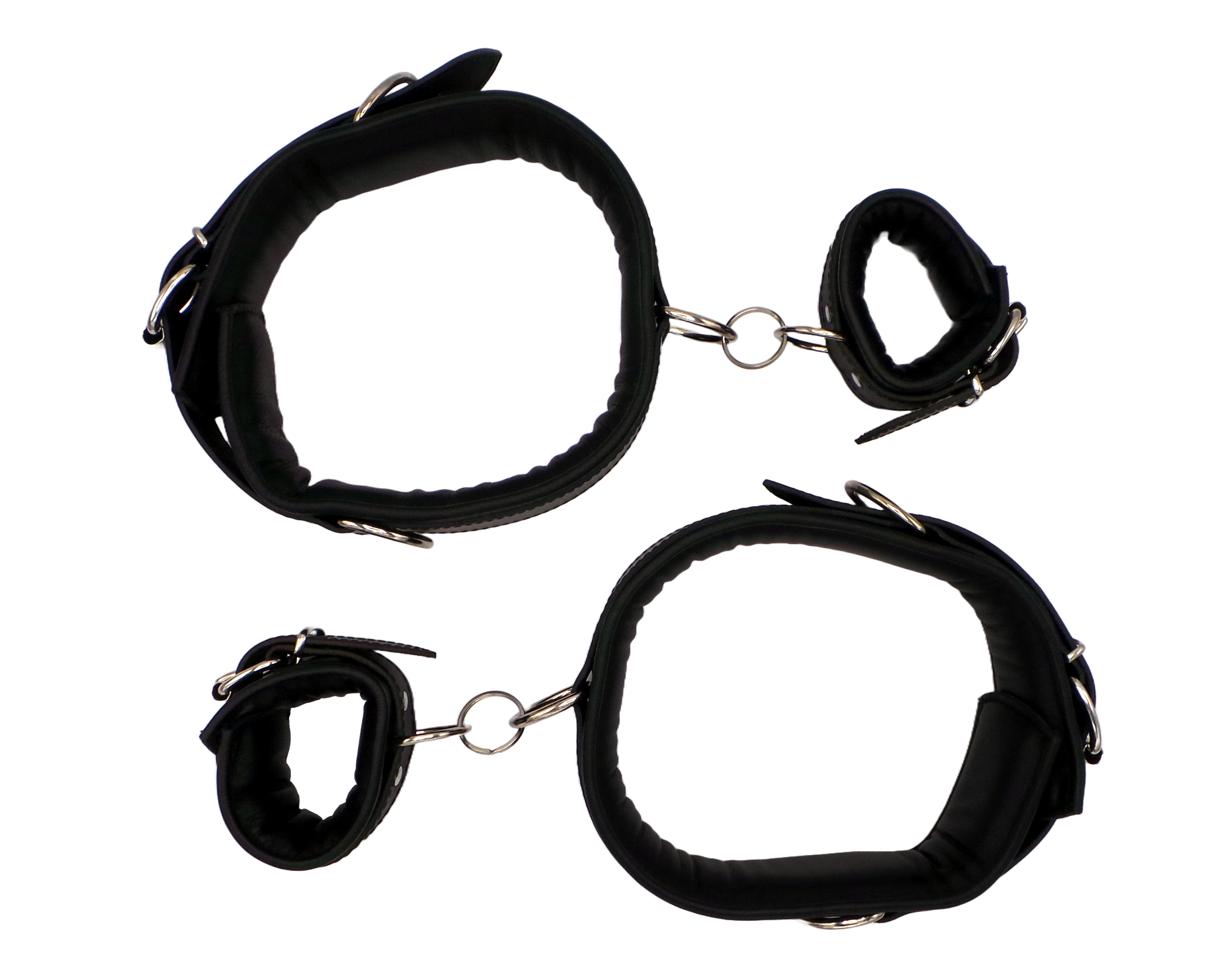 Oberschenkelfessel und Handfessel in schwarz in Draufsicht